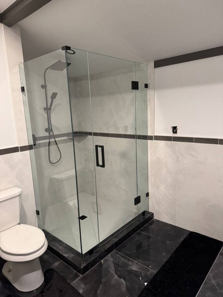Custom frameless shower enclosure by Wintek Glass