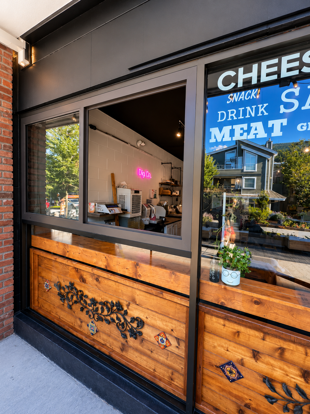 Commercial storefront glass installation at Dip Co Deli restaurant Deep Cove North Vancouver by Wintek Glass